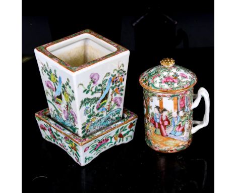 A Chinese Canton enamel square planter on stand, height 13cm, width 8cm, and a similar Canton enamel cup and cover, height 12