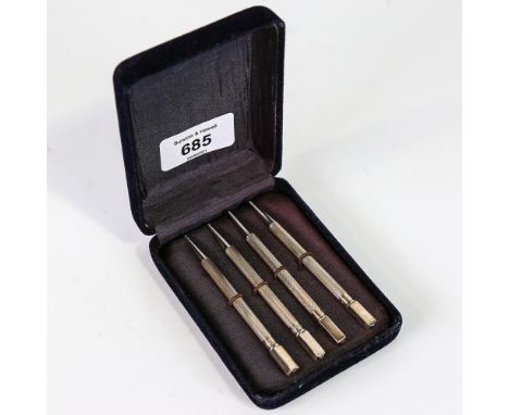 A set of 4 Antique sterling silver Bridge propelling pencils, engine turned decoration, length 9cmNo damage or repair, light 