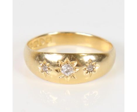 An early 20th century 18ct gold 3-stone diamond gypsy ring, set with old-cut diamonds, total diamond content approx 0.15ct, h