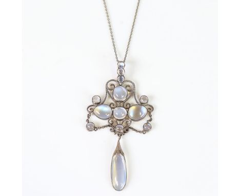An early 20th century Arts and Crafts Continental moonstone pendant necklace, unmarked white metal wirework settings with cab