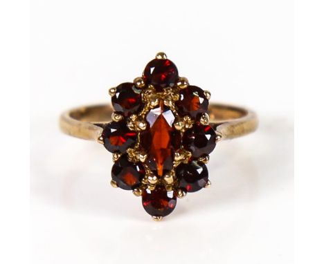 A late 20th century 9ct gold garnet cluster dress ring, set with marquise and round-cut garnets, hallmarks London 1975, setti