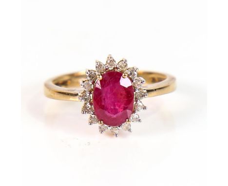 A modern 9ct gold ruby and diamond cluster ring set with oval mixed-cut ruby and round brilliant-cut diamonds, setting height