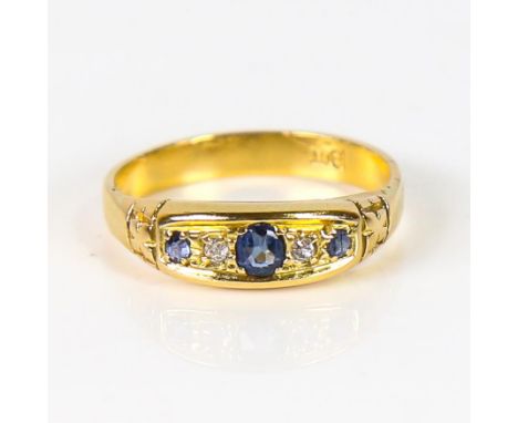 An early 20th century 18ct gold graduated 5-stone sapphire and diamond half hoop ring, setting height 5.7mm, size O, 3.3gNo d