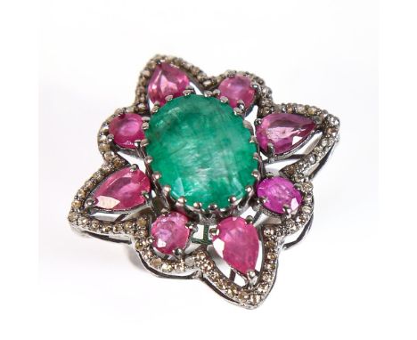 A large modern oxidised silver emerald ruby and diamond star ring, openwork set with oval mixed-cut emerald and oval and pear