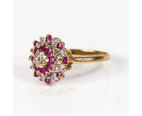 A late 20th century 9ct gold ruby and diamond cluster flowerhead ring, setting height 13.4mm, size M, 2.2gNo damage, all ston