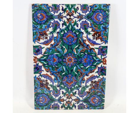 A large 19th century Turkish Iznik pottery tile, 33cm x 48cm 
