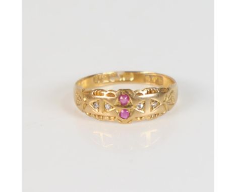 An early 20th century 18ct gold ruby and diamond dress ring, set with round-cut rubies and rose-cut diamonds, maker's marks M