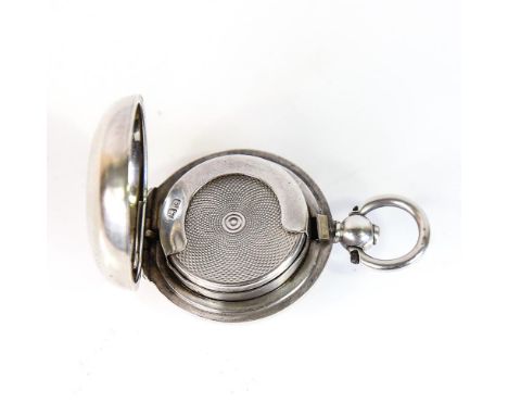 A late Victorian silver sovereign case, circular form with engine turned decoration, by E J Trevitt & Sons, hallmarks Chester