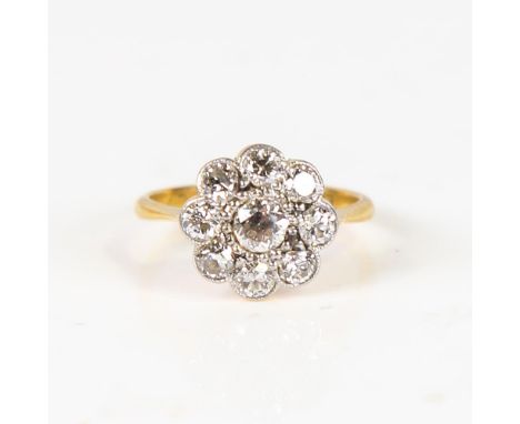 An Antique 18ct gold diamond cluster flowerhead ring, set with old European-cut diamonds, total diamond content approx 1.1ct,