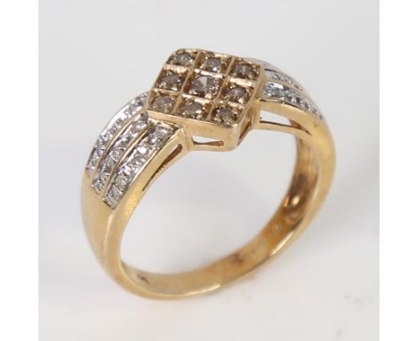 A modern 9ct gold champagne diamond and diamond cluster dress ring, setting height 10mm, size O, 3.9gNo damage or repair, all