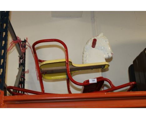 A VINTAGE TRIANG ROCKING HORSE