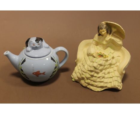 A WADE FELINE COLLECTION TEAPOT & A WADE SEATED LADY FIGURE