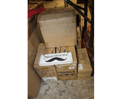 A LARGE QUANTITY OF CERAMIC WALL HANGING MOUSTACHE PLAQUES