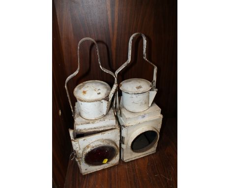 A BOX CONTAINING TWO VINTAGE BR (BRITISH RAIL) LAMPS