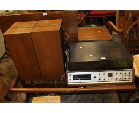 A RETRO CROWN RECORD PLAYER & SPEAKERS ON A RETRO TEAK TABLE