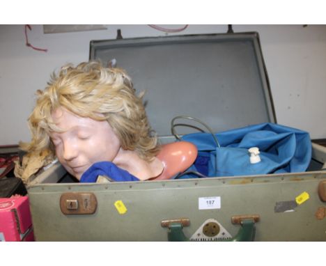 A VINTAGE 'RESUSCI ANDY' RESUSCITATION DOLL IN CASE