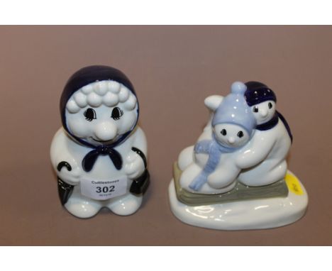A PAIR OF WADE CHRISTMAS FIGURES 1995 'SNOW WOMAN' AND & 1996 'SNOW CHILDREN'