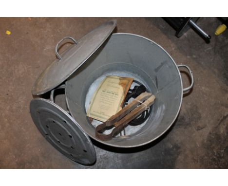 A VINTAGE GALVANIZED WASHING MACHINE WITH ACCESSORIES AND ORIGINAL INSTRUCTIONS