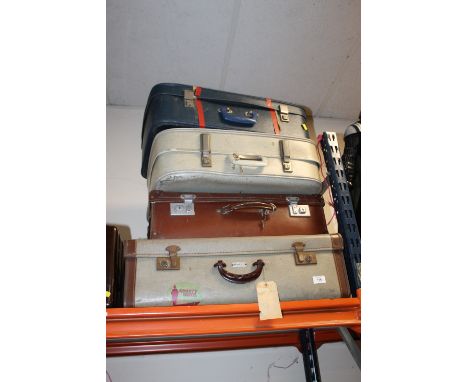 FOUR VINTAGE SUITCASES (1 BROWN, 1 BLUE, 1 CREAM 1 BROWN/GREY) SOME WITH ORIGINAL LABELS