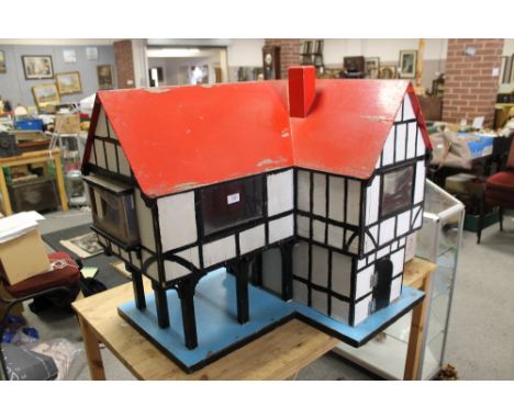 A LARGE VINTAGE TUDOR STYLE WOODEN DOLLS HOUSE (APPROX  W 32", D 26.5" H 32 ")