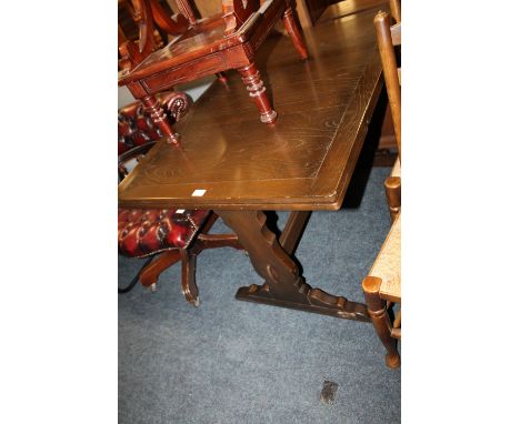 AN ERCOL STYLE DRAWLEAF DINING TABLE