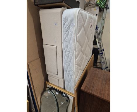 A Bensons for Beds double bed with divan base, mattress and headboard.