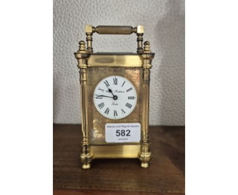 20th century brass carriage clock with enamel dial by Charles Frodsham London