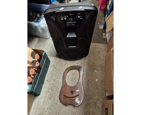 A QTX Busker 12 pa/amp and a yre Harp