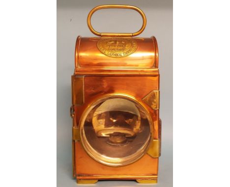 A Merryweather copper and brass Victorian steam fire engine oil hand lamp, 27.5 cm high  See illustration Condition report Re