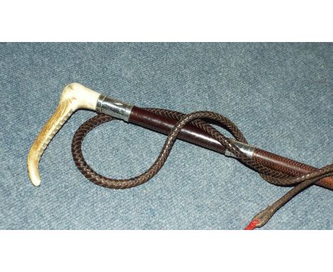 A Swaine & Adeney Ltd whip, with silver mounts, inscribed J D'A Anderson 5th Innis DG From Ballyhosset 7-12-37, London 1937