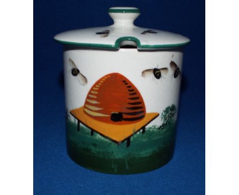 A Plichta pottery Wemyss ware honey pot and cover, decorated bees and a hive (chipped) 10.5 cm high