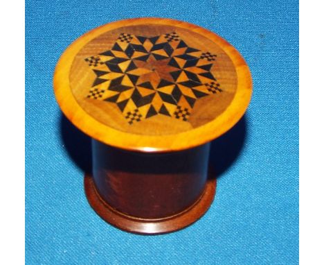 A Tunbridge Ware nutmeg grater, 4.5 cm high Condition report Report by NG

Appears to be a modern item. Base chipped and repa