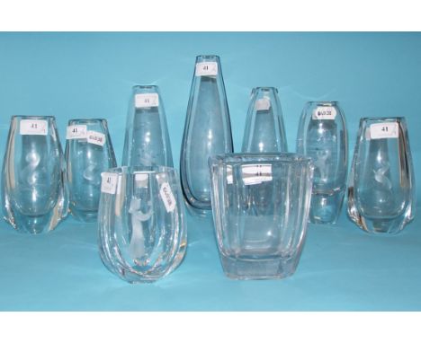 An Orrefors glass vase, decorated a girl, and eight other similar vases (9)