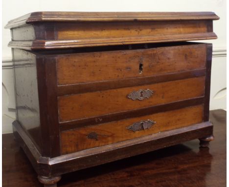 A 19th century French box, in the form of a commode chest of drawers, on bun feet, 55 cm wide