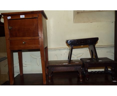 A carved oak stool, two others, and a bedside table, 38 cm wide (4)