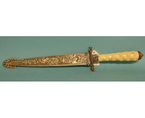 A South American dagger, with a white coloured metal and ivory handle