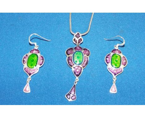 An Art Nouveau style silver and enamel pendant, and matching earrings