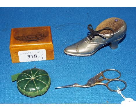 A Mauchline ware box and cover, decorated Osborne House Isle of Wight, containing a thimble and a cotton reel, 6 cm wide, two