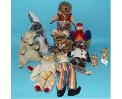 A Steiff kid, 11.5 cm high, a similar rabbit and hedgehog, plush and other toys, a dolls pram, tennis and other rackets (qty)