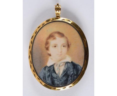 An oval bust portrait miniature, of a boy wearing a blue coat, watercolour, 6.5 x 5 cm, in a yellow coloured metal frame, wit