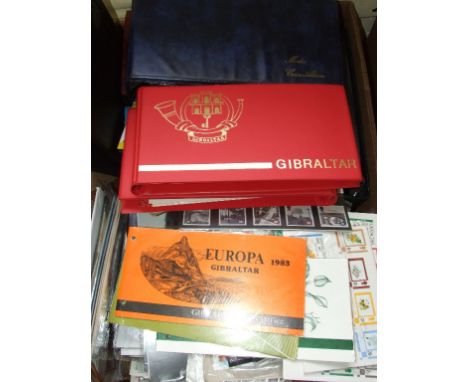 Assorted Collector's Packs of mint stamps, Gibraltar stamps, presentation packs, first day covers and other items (box)