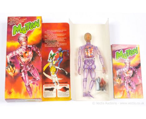 Denys Fisher, Strawberry Fayre vintage Cyborg Muton figure, Mint complete, within Near Mint opened packaging.