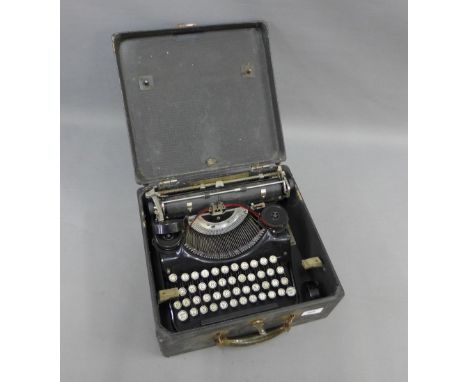 Vintage typewriter in a fitted case 