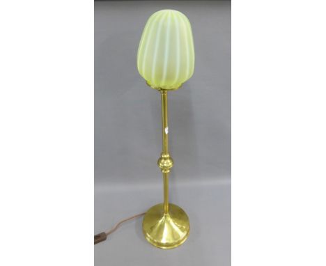 Brass lamp with yellow opaque glass shade, height overall 90cm 