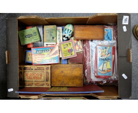 A good collection of vintage toys, puzzles, chess and draughts sets