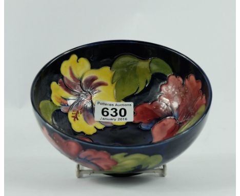 Moorcroft footed bowl in the hibiscus design, diameter 16cm (light scratches to interior)