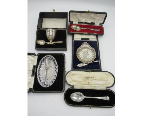 Hallmarked silver cased fruit serving set in the form of a shell, Sheffield 1922-1923, a hallmarked silver cased egg cup and 