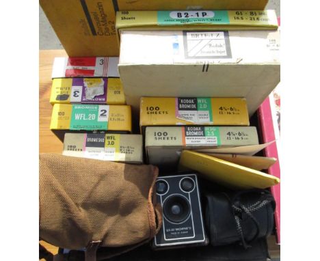 Early C20th quarter plate camera with Vario shutter and additional plates in original canvas case, a Kodak six-twenty Brownie
