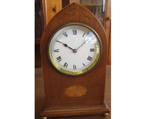 Edwardian inlaid mahogany lancet cased timepiece with white Roman dial and brass ball feet, H23cm, and an Art Deco oak barome