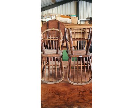 Set of four C19th hoop and stick back dining chairs with solid seats on ring turned supports with stretchers and an elm singl